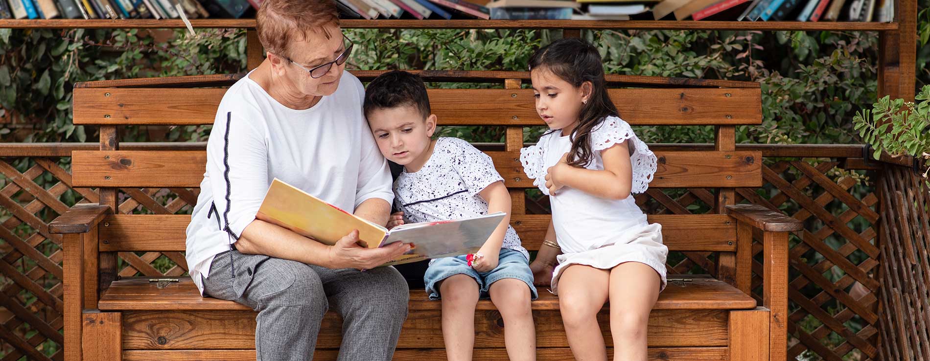 Grandma is reading Jewish Kids Books to her grandchildren